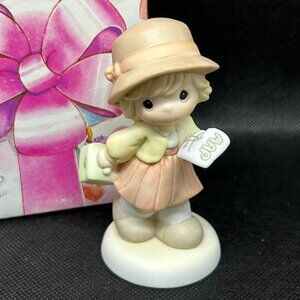 Precious Moments “Thursday's Child Has Far To Go" figurine